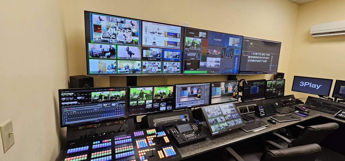 The control room: multiviewer wall and switcher consoles, mid-session