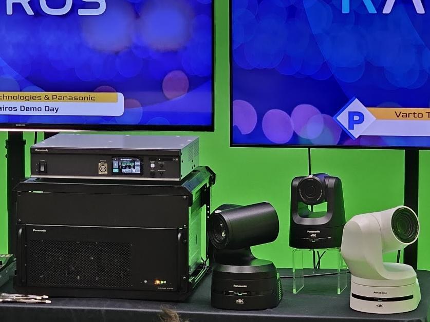 A PTZ camera lineup with controller and switcher mainframe on the demo bench