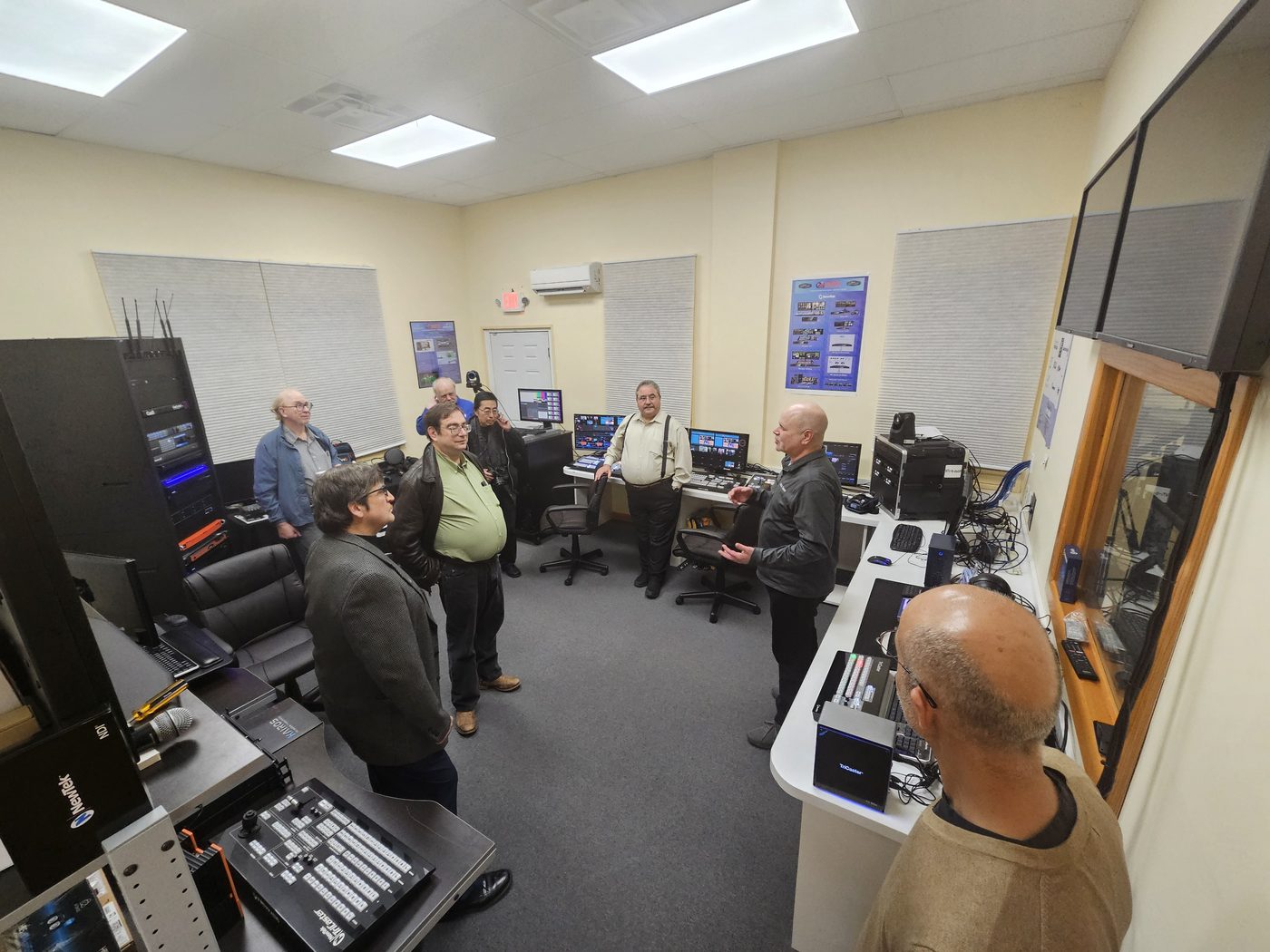 The rack and production systems room at Varto with equipment racks, monitors and a work position