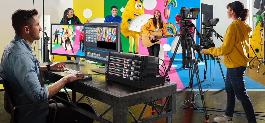 Small studio with a rack of HyperDecks recording a multi-camera shoot to a shared workstation