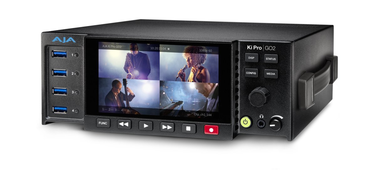 An AJA Ki Pro GO2 recorder with four front USB ports and a screen showing four camera views