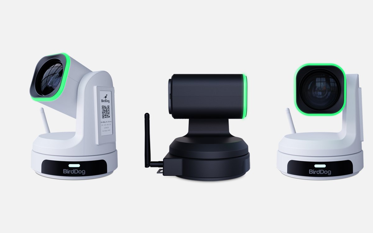 Three BirdDog X1 series PTZ cameras in white and black, one showing its Wi-Fi antennas