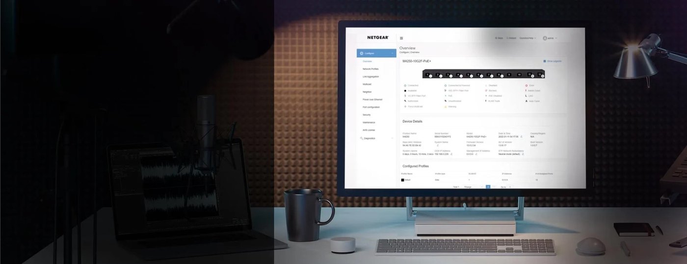 NETGEAR AV web interface open on a desktop monitor