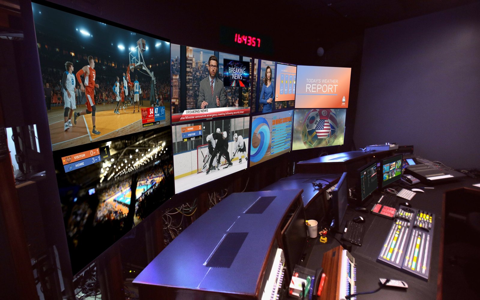 A dim production control room with a wall of monitors showing basketball, hockey and news graphics