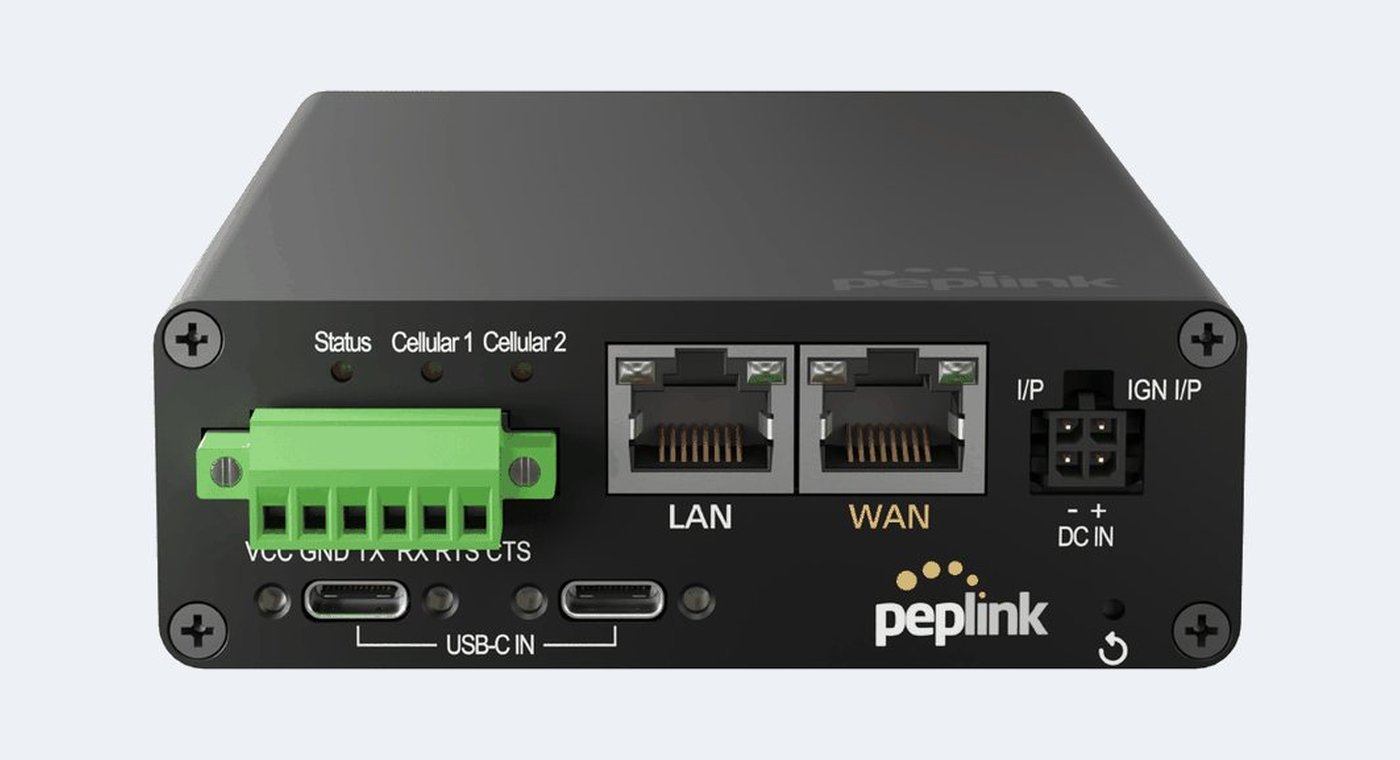A Peplink MAX Transit Duo Pro router, front three quarter view
