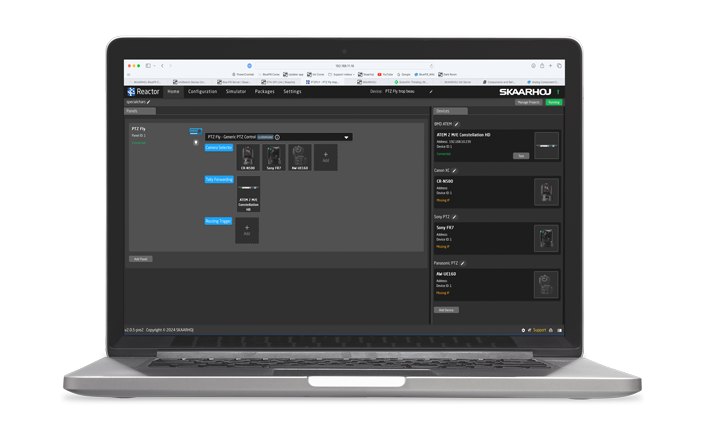 A laptop showing the SKAARHOJ Reactor web interface pairing a panel with cameras and a switcher