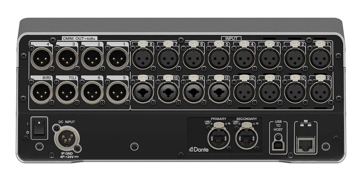 The rear panel of a Yamaha DM3 with its XLR inputs and outputs and the two Dante etherCON ports
