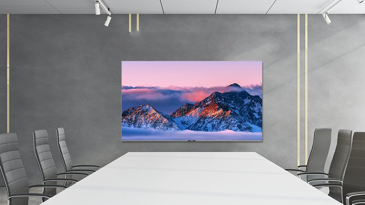 Rendering of a boardroom with a large wall-mounted LED display above a long white table