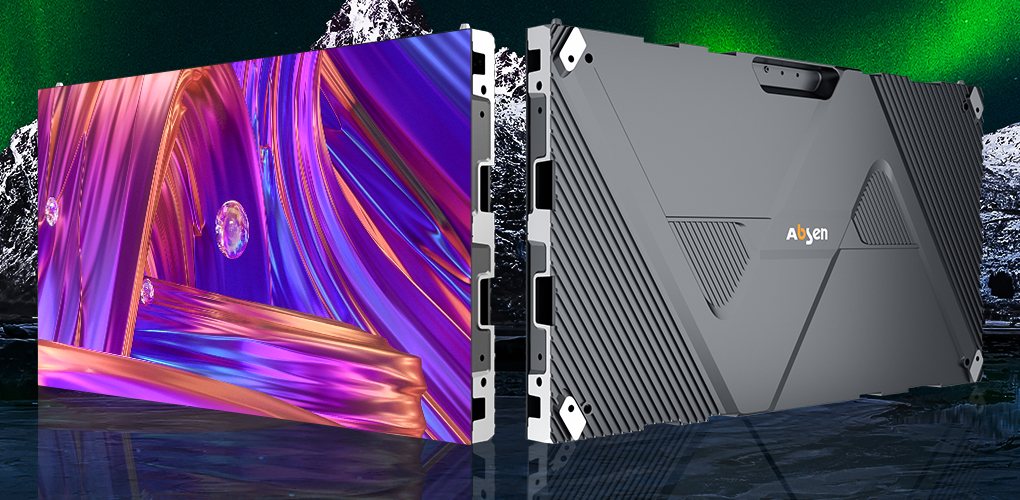 Two LED cabinets on a reflective floor, one showing a colorful image on its face and one showing its die-cast rear housing