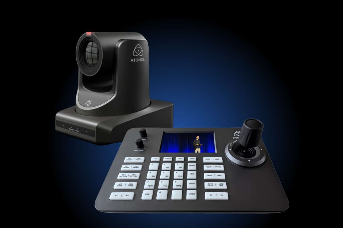An Atomos A-Eye PTZ camera beside an A-Eye Control joystick controller, lit in blue on a black background