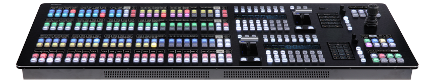 Control panel with two fader bars, a joystick and rows of lit buttons