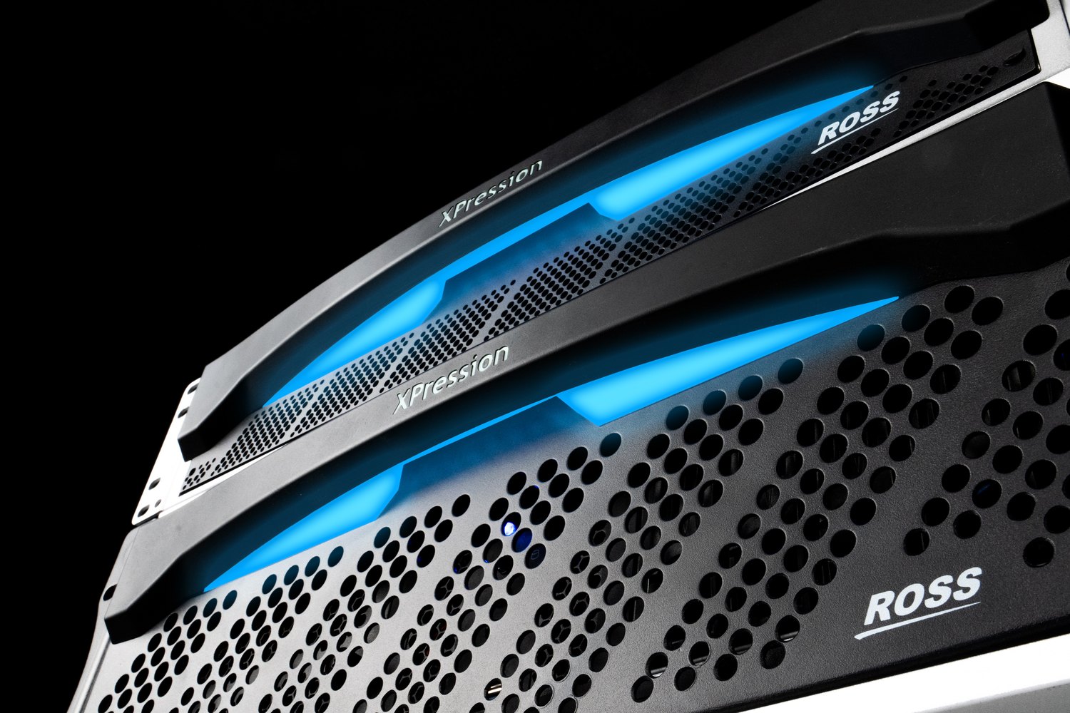 Close-up of XPression 2RU and 4RU engines with blue light bars across their front panels